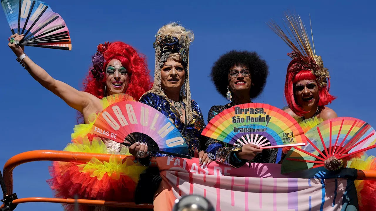 Gay pride revelers in Sao Paulo reclaim Brazil's national symbols