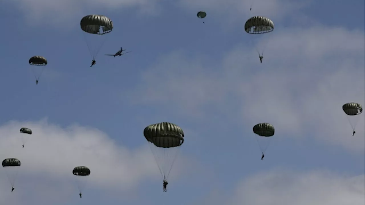 A mass parachute jump over Normandy kicks off commemorations for the 80th anniversary of D-Day