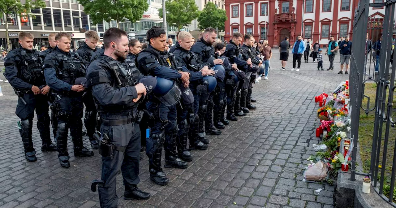 German police officer attacked by knifeman during protest dies