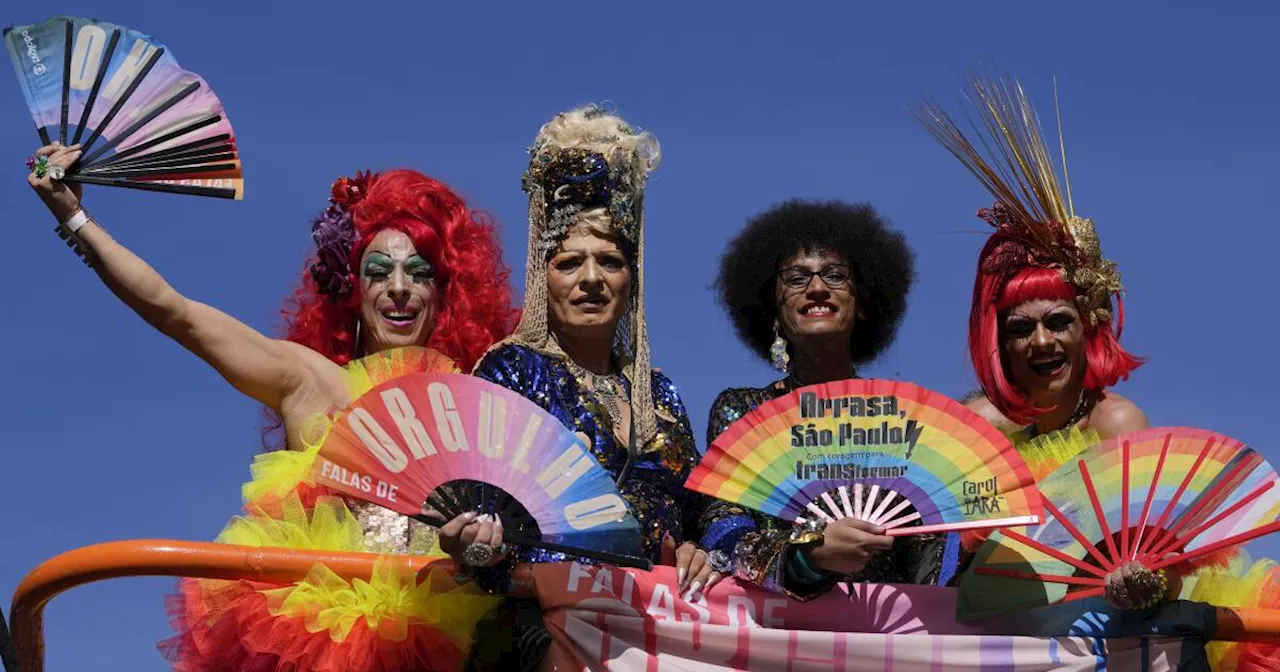 Gay pride revelers in Sao Paulo reclaim Brazil's national symbols