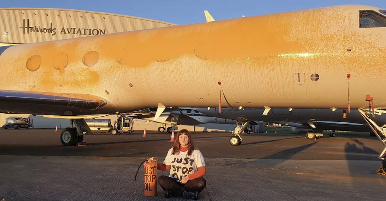 Climate activists arrested for spray-painting private jets orange at London airport