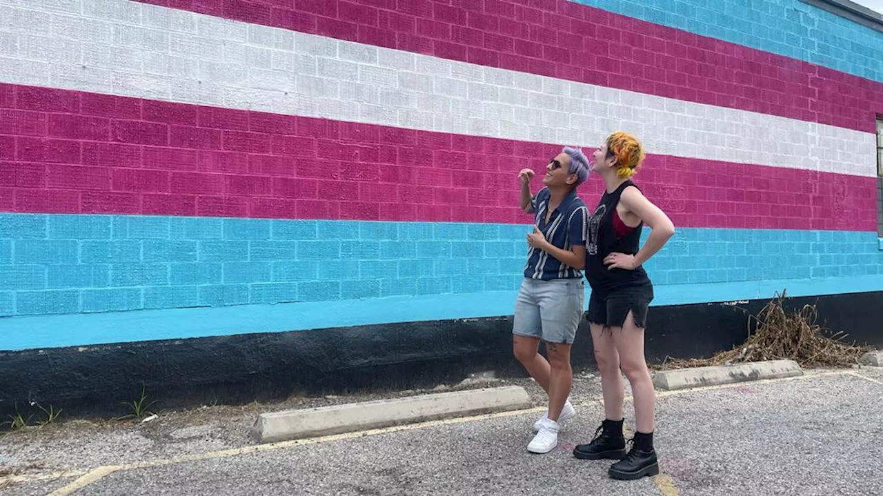 Largest trans flag mural in Austin unveiled on North Lamar