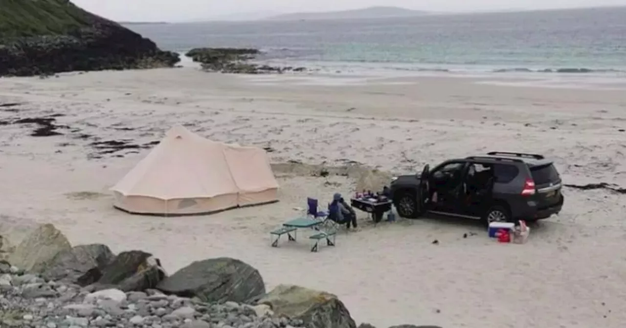 Fury as family set up camp on protected Scots beach despite warnings