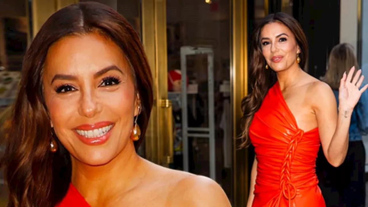 Eva Longoria, 49, showcases her toned frame in a red leather dress with a thigh-split as she...