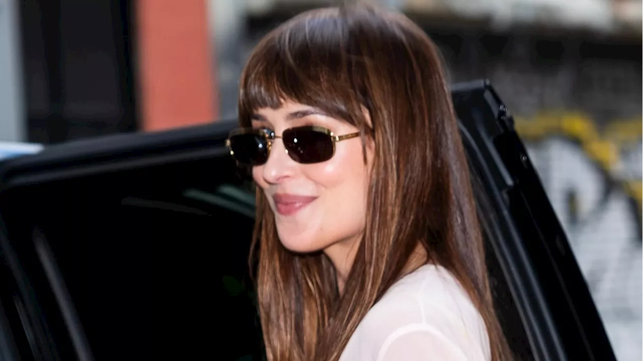 Dakota Johnson’s Bright Yellow Skivvies Practically Glow Under Her Sheer Top and Skirt