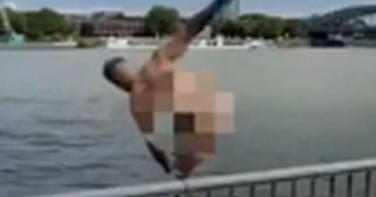 Scotland fan jumps into German river in bizarre stunt at EURO 2024