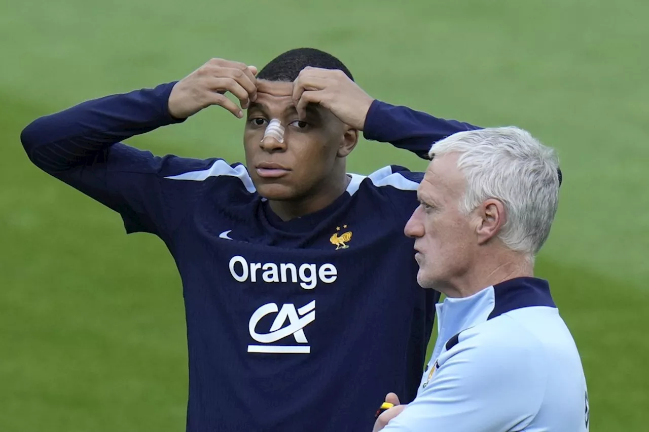 France coach says he assumes masked Mbappé will be available for Netherlands match at Euro 2024