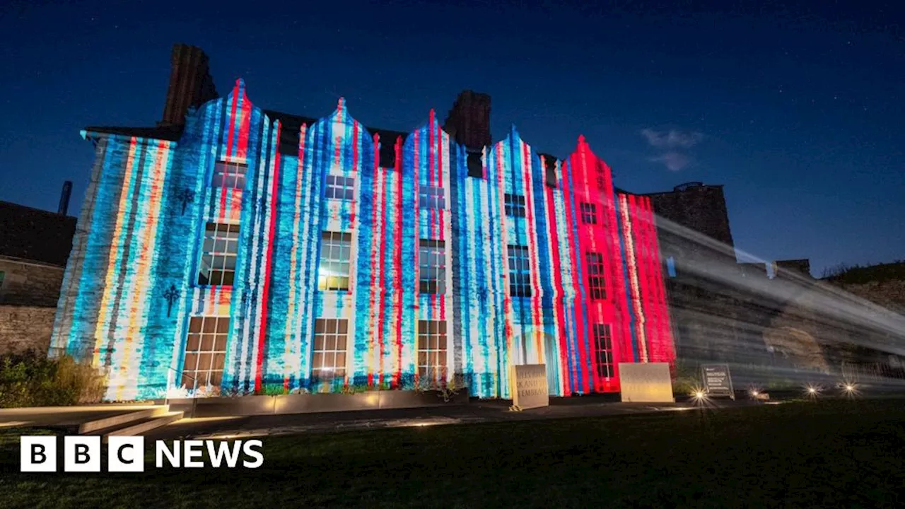 Climate Stripes projected on to BT Tower and Hay Castle