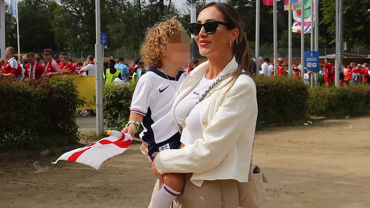 Lauryn Goodman breaks her silence on WAG war after attending England game in Frankfurt with son...