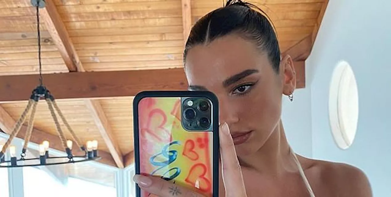 Dua Lipa Shines in a Sequined Snakeskin String Bikini