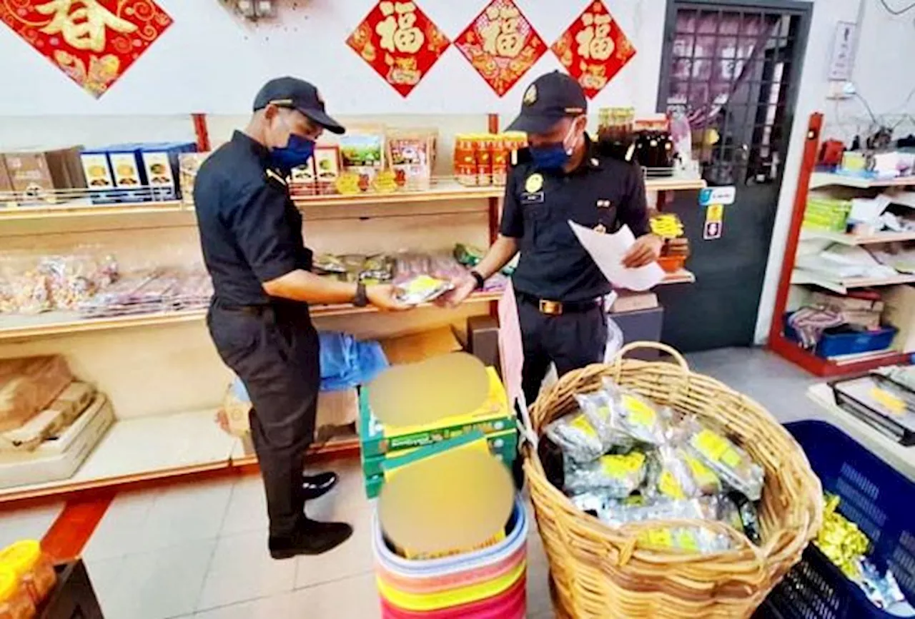 Taiping biscuit maker raided for illegal use of halal logo