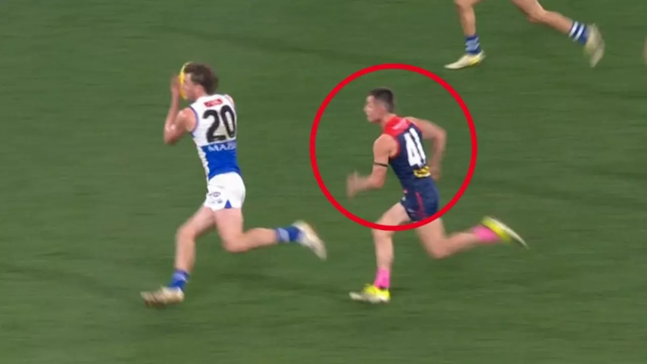 Debutant Kynan Brown produces match-saving tackle to help Melbourne hold off North Melbourne