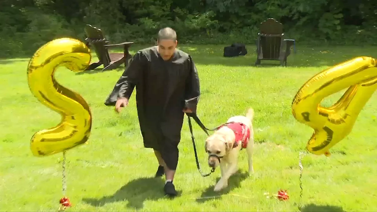 Proud graduates: Student-dog duo make history in Saanich School District