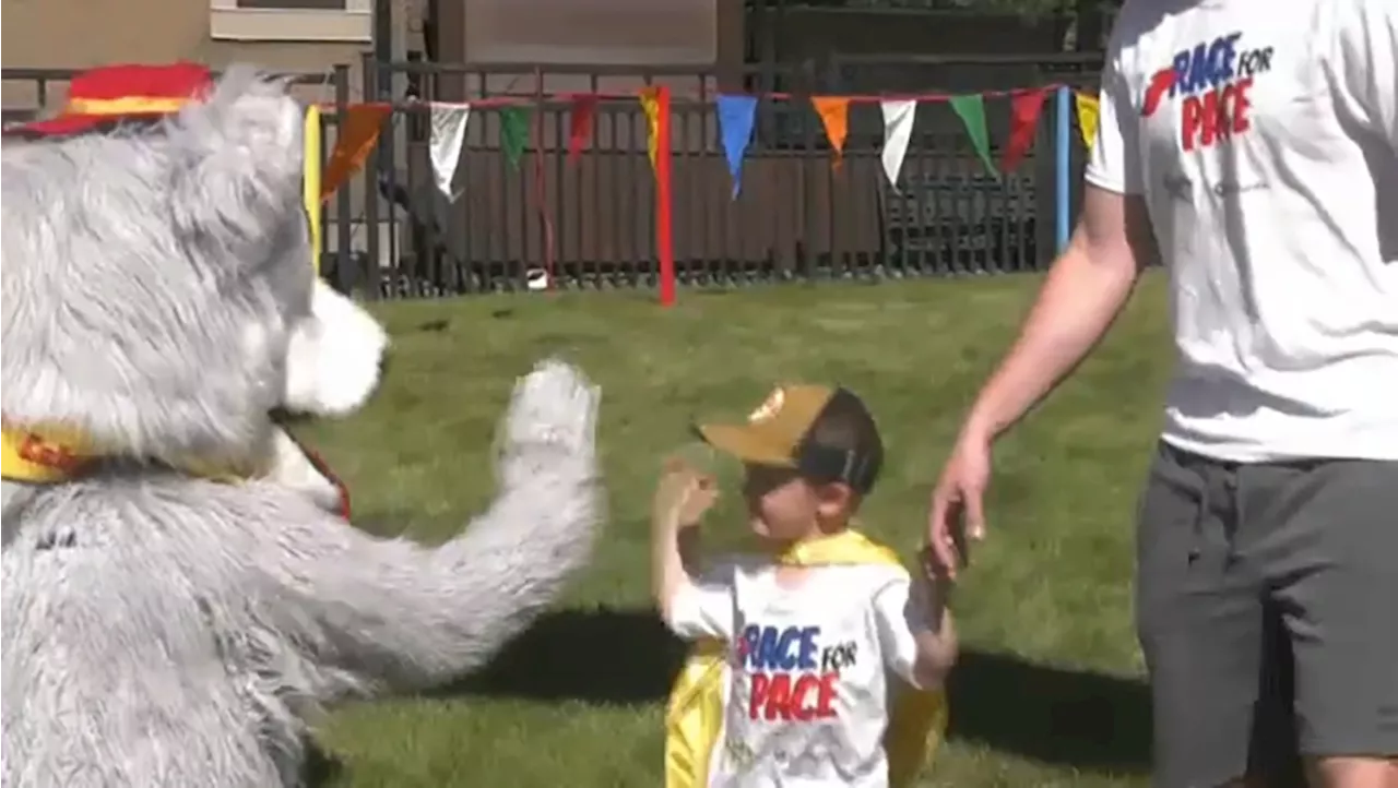 Superheroes take over southeast Calgary park to help children with diverse needs