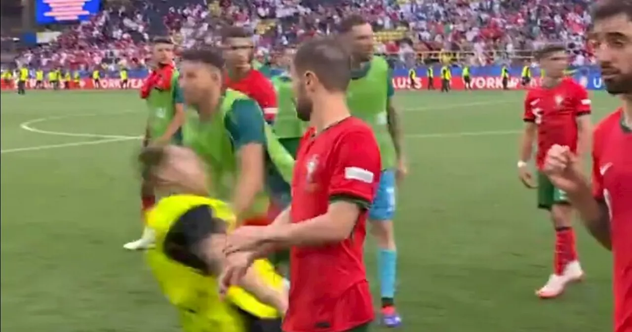 Euro 2024 security slammed as Portugal star wiped out while Ronaldo fan tackled