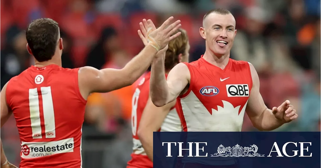 Swans storm to victory in the rain after dominating Giants in Sydney derby