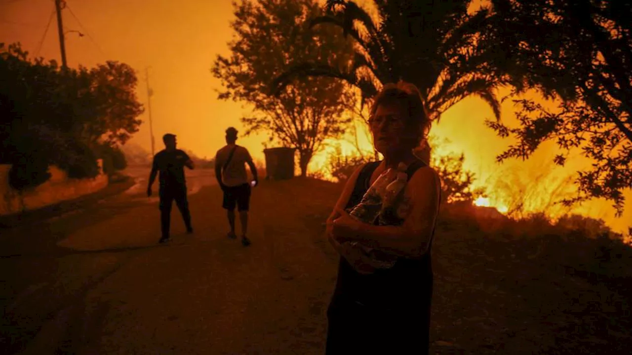 Deadly wildfires rage across Greece as high winds fuel blazes