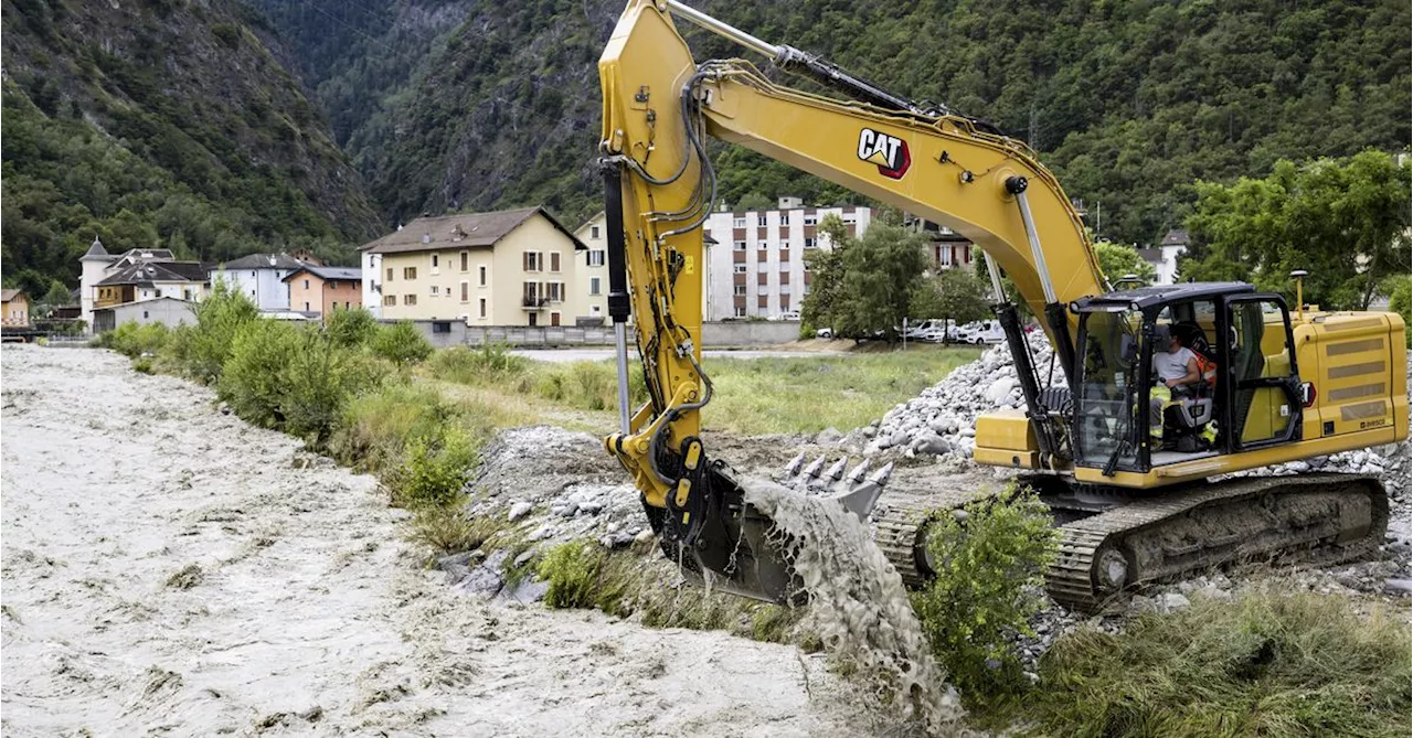 Three missing in a landslide in Swiss Alps as heavy rains cause flash floods