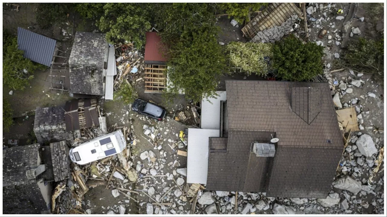 1 person found dead and 2 still missing after floods, rockslide hit a Swiss Alpine village