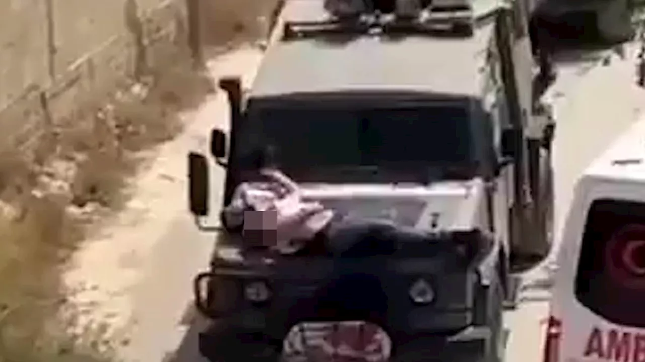 Video of wounded Palestinian man tied to hood of IDF jeep emerges