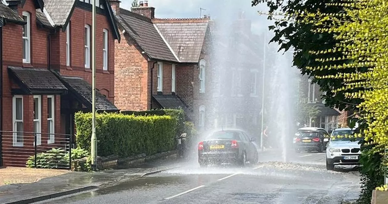 Huge jet of water covers road after water pipe bursts