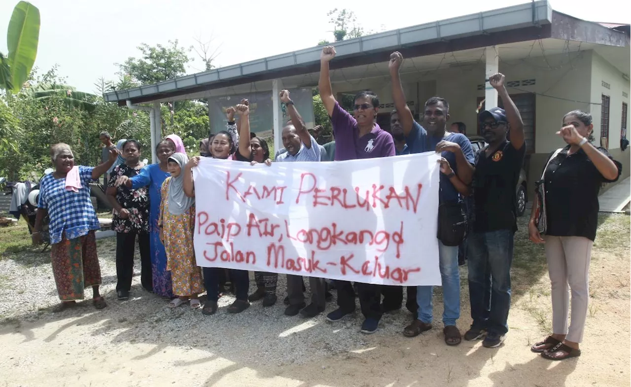 Former squatters' road, water access blocked by another squatter in Perak