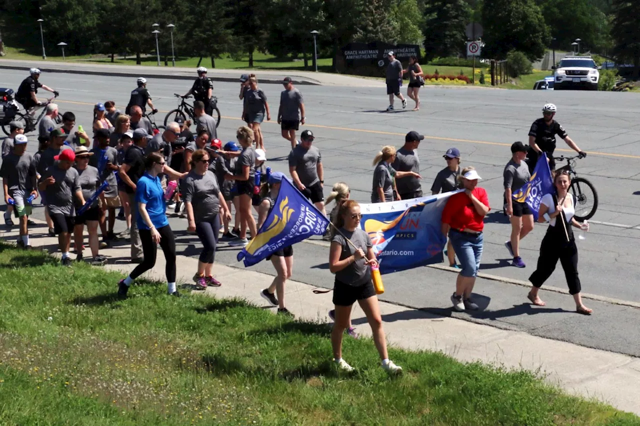 Participants brave sweltering heat for Law Enforcement Torch Run