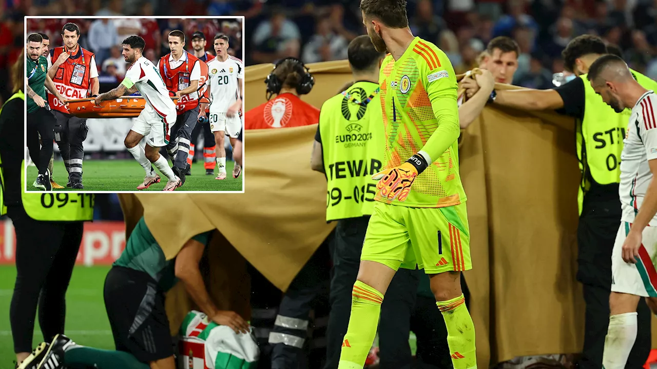 Scotland vs Hungary suspended with players in tears as injured Barnabas Varga obscured by sheets while...