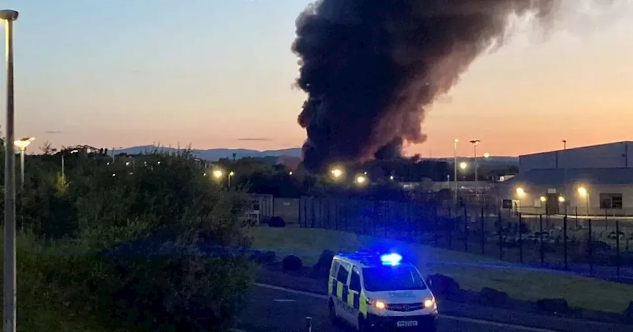 Scots urged to 'remain indoors' as fire crews battle industrial estate blaze