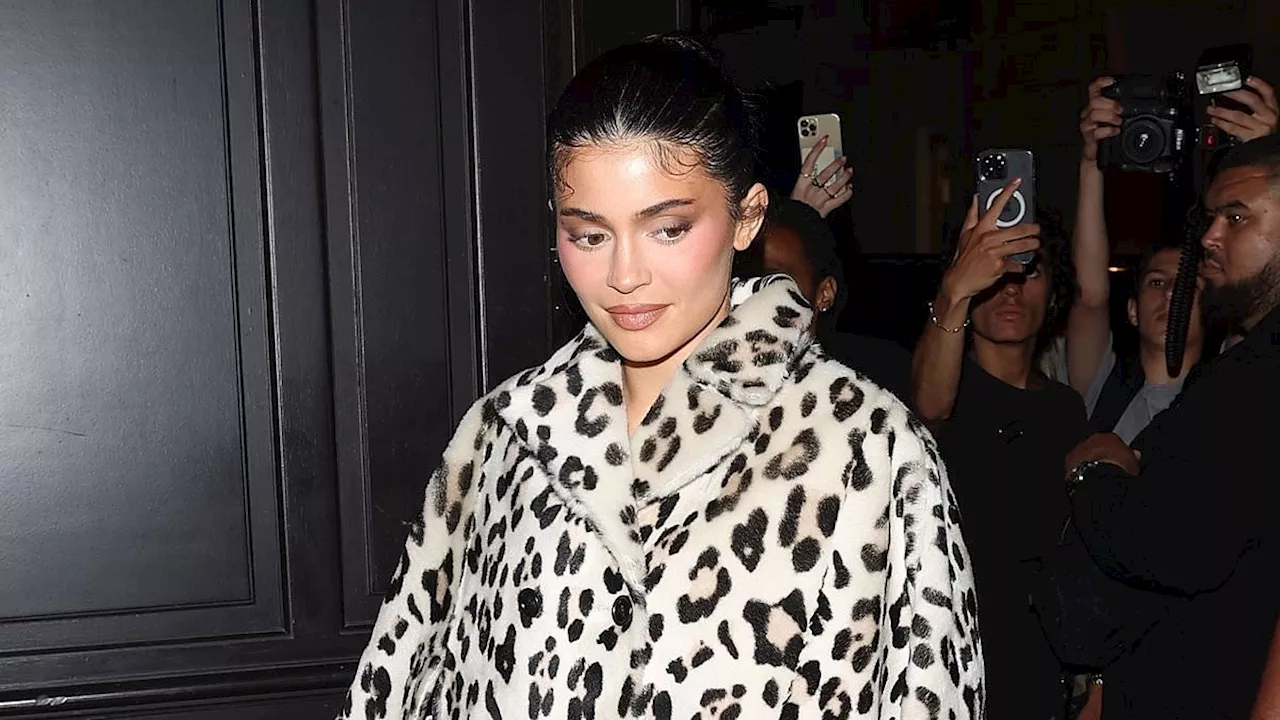 Kylie Jenner prowls around Paris in leopard print cape and matching heels