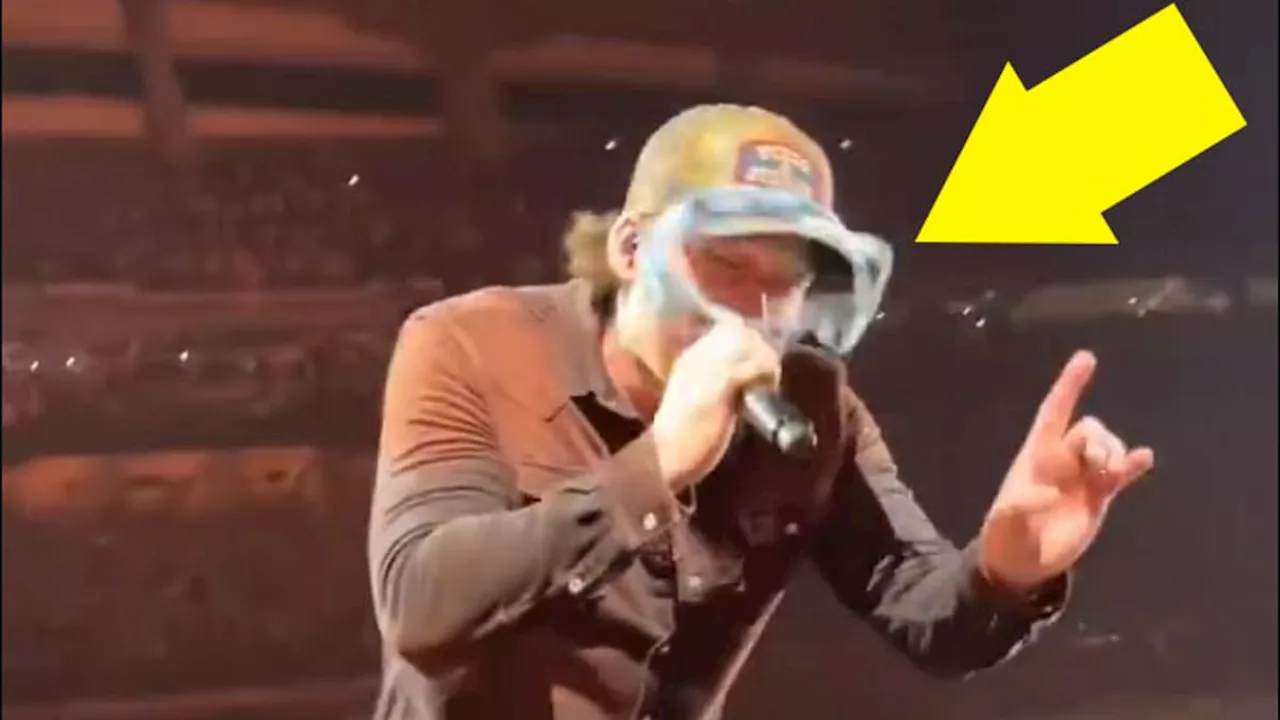 Morgan Wallen is hit in the face by THONG underwear thrown by overzealous fan in shock moment during...