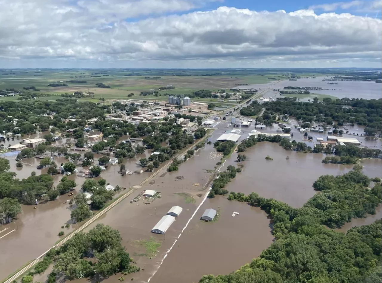 Heavy rain and flooding cause Iowa bridge to collapse into river