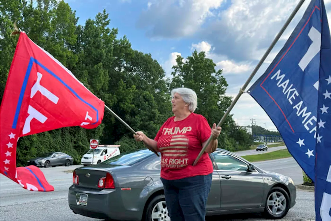 In one affluent Atlanta suburb, Biden and Trump work to win over wary Georgia voters