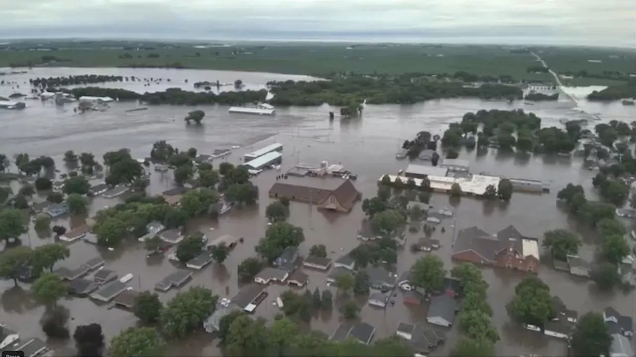 1 killed as midwestern flooding collapses rail bridge, forces evacuations