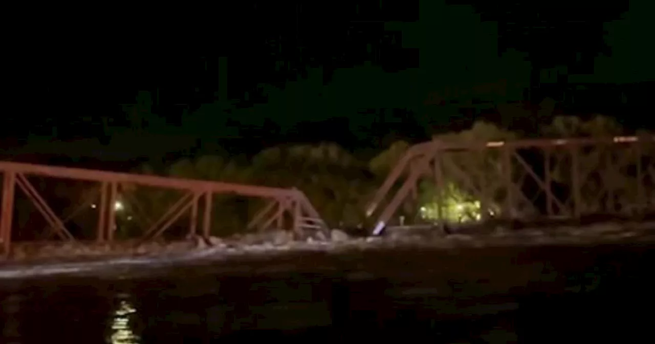 Moment Iowa bridge collapses into river amid severe flooding
