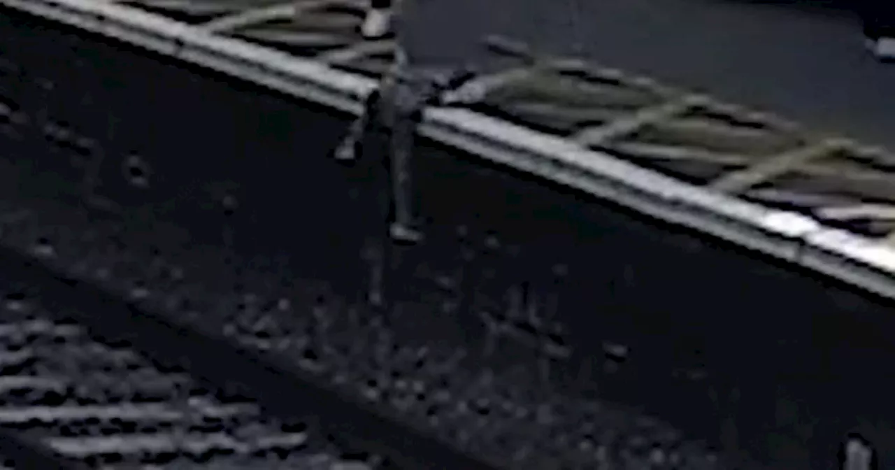 Terrifying footage shows child falling onto train tracks in Notts