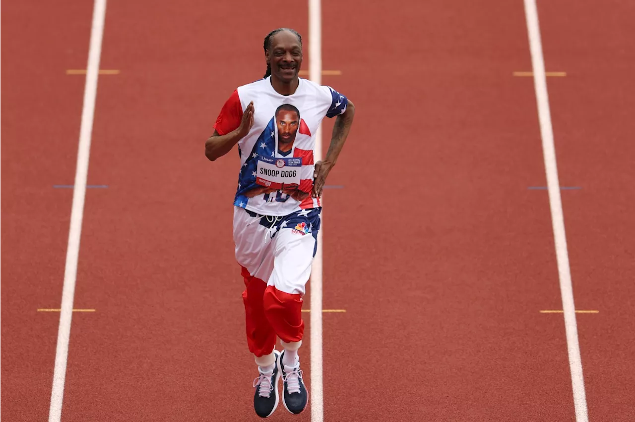 Snoop Dogg Earns His Olympic Stripes With 200-Meter Sprint