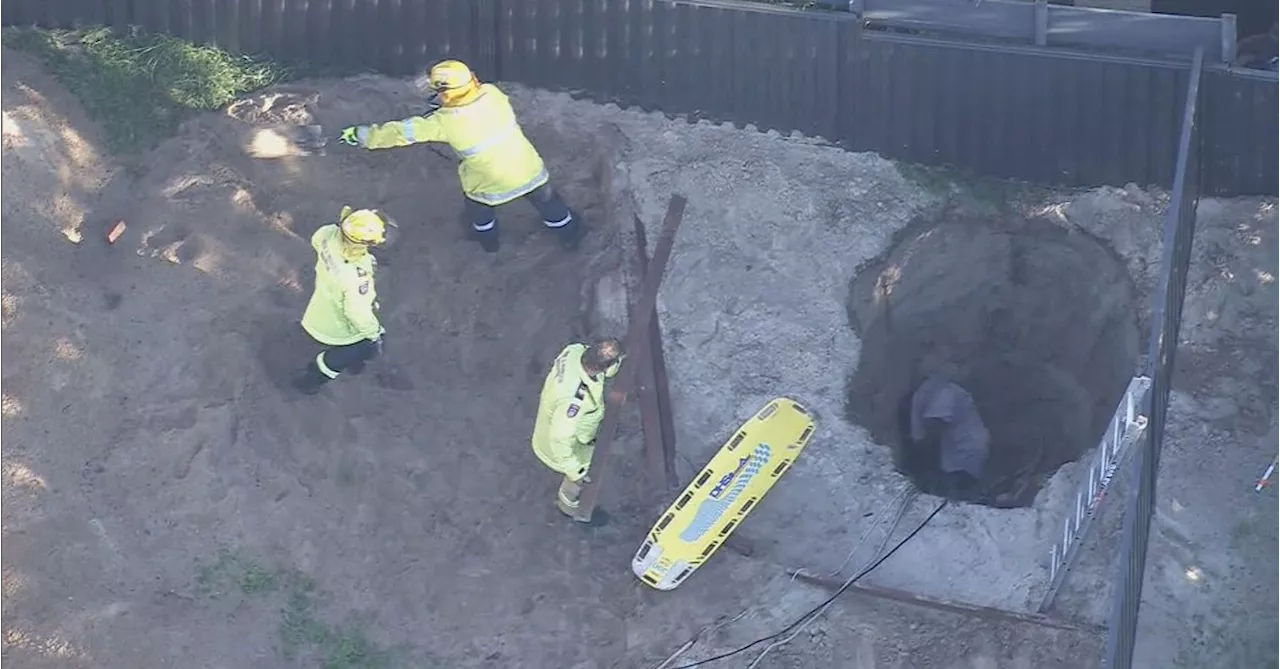 Man stuck in Perth backyard hole for hours rescued in major operation