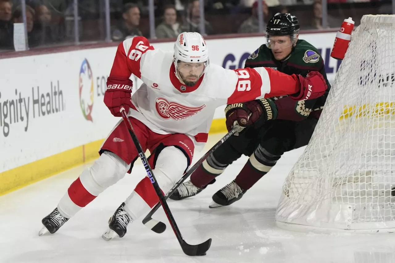 The Sharks acquire Jake Walman and a 2nd-round draft pick from the Red Wings