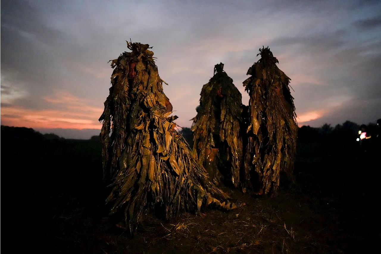 PHOTO GALLERY: Philippine villagers smear mud on their bodies to show devotion to St. John the Baptist | Aaron Favila