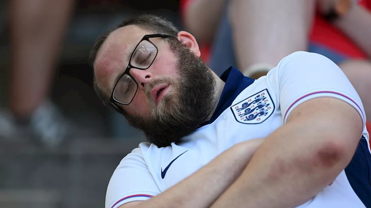 Fed-up England fans pelt Gareth Southgate with beer cups and BOO as the team goes on lap of 'honour'...