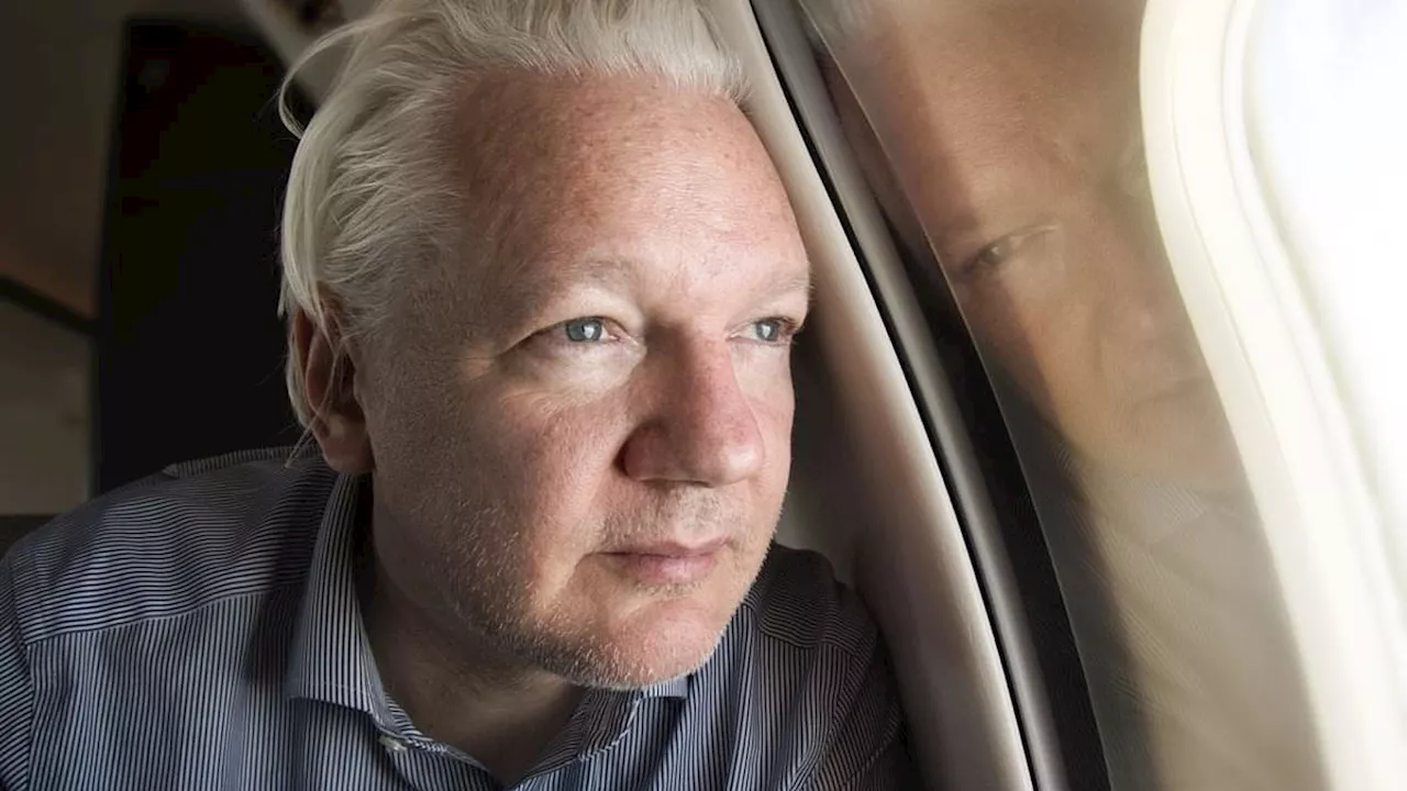 Julian Assange returns to Australia a free man to be reunited with wife Stella