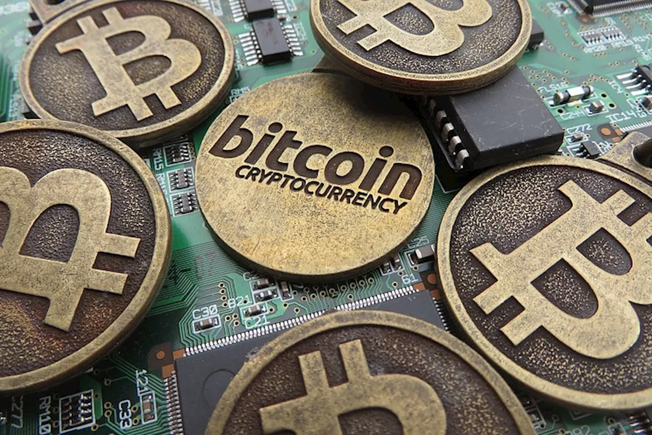 Bitcoin breaks below descending wedge, finding support on key level