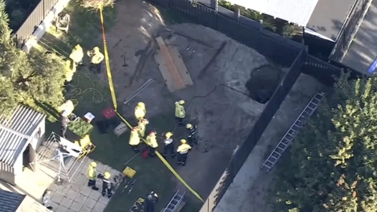 ‘Precarious situation’: Man trapped in deep hole for hours in backyard rescued