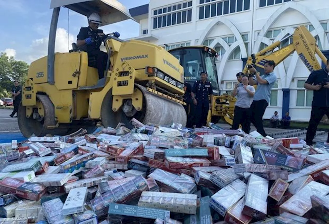 Cops dispose of seized cryptocurrency mining machines and contraband worth thousands in Johor