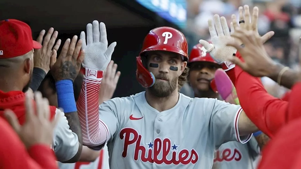 Harper homers, helps turn triple play in Phillies' win over Tigers