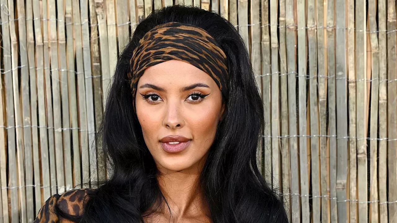 Maya Jama flashes her toned abs in a fierce animal print look as she joins glamorous Alexa Chung,...