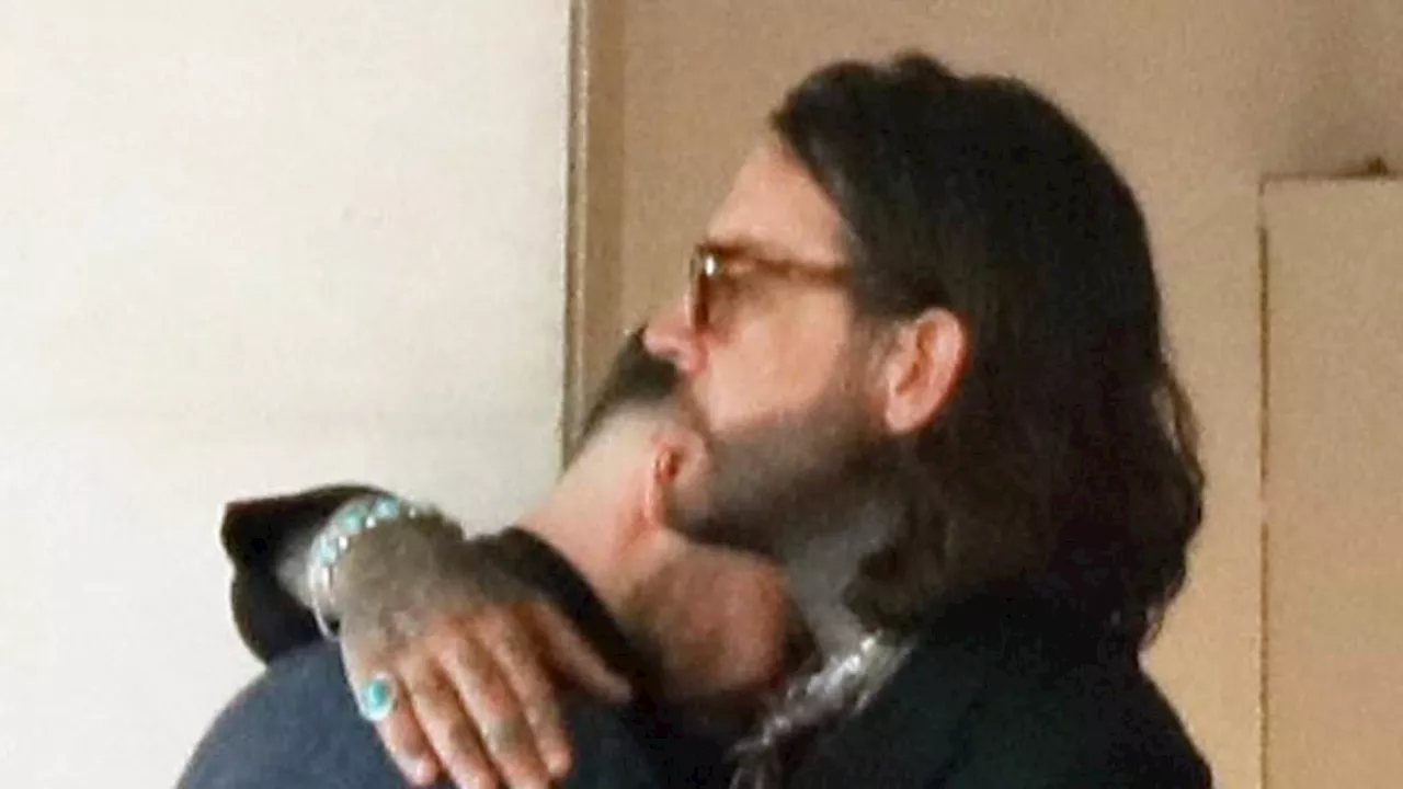 Sam Thompson is consoled by pal Pete Wicks after breaking down in tears at the TRIC Awards