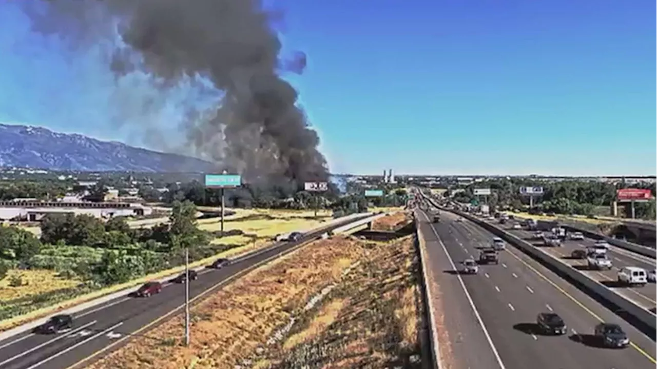 Heavy black smoke seen for miles after grass fire ignites in Weber County