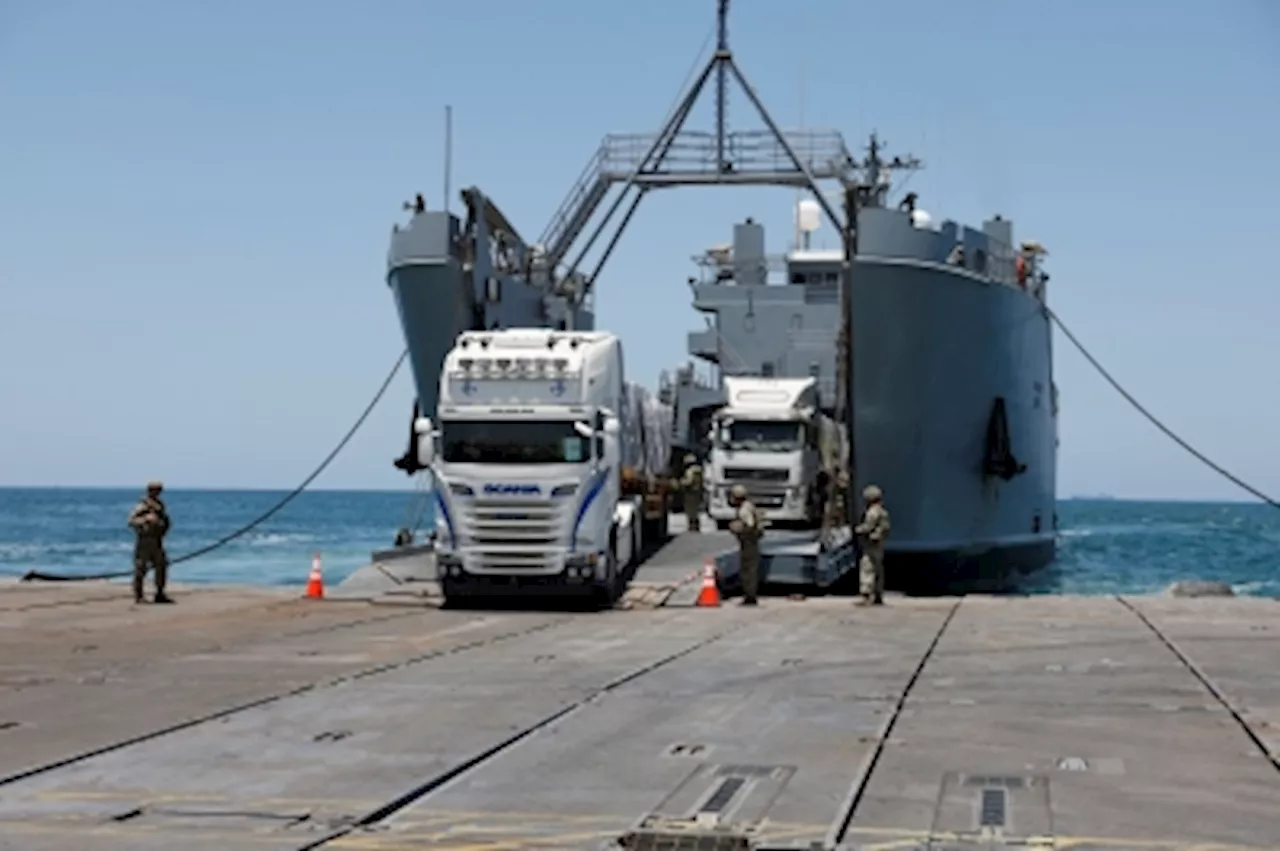 On Gaza pier, US troops confront waves, destruction and aid backlog